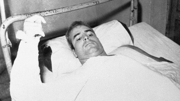  In this undated file phot , US Navy Lieutenant Commander John S McCain lies injured in North Vietnam.