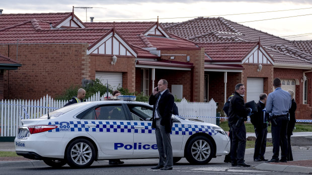 Homicide and forensic police at the scene of the stabbings in Kings Park on Saturday.