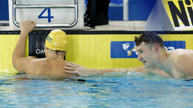 Isaac Cooper is consoled by Ryan Murphy of the United States after the re-swim of the men’s 50m backstroke final.