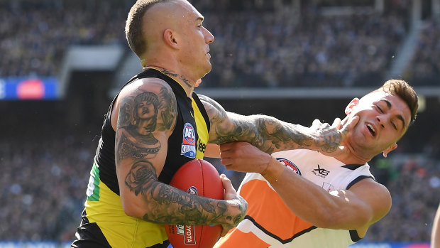 Dustin Martin with Sherrin in hand at the 2019 Grand Final.