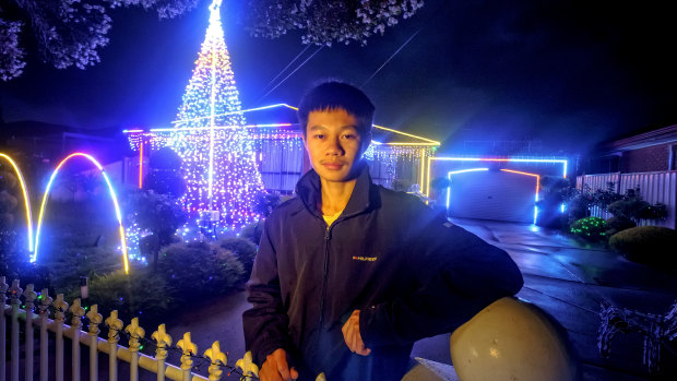 Minh Tuan Nguyen in front  of his home in Kings Park.