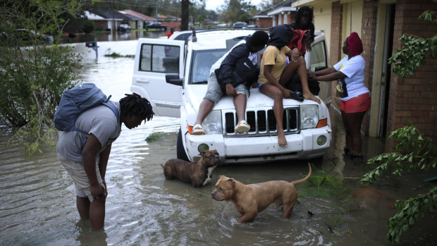 Residents wait to be rescued in LaPlace, Louisiana, after Hurricane Ida smashed through the state. 