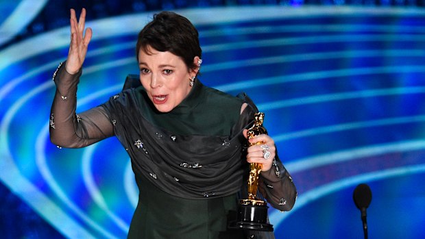 Olivia Colman reacts as she accepts the best actress award at the 2019 Oscars. 