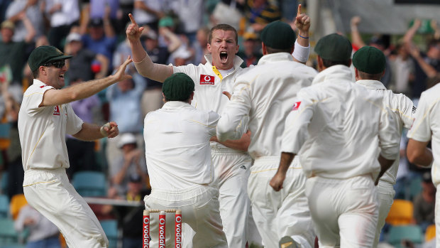 Siddle celebrates his famous hat-trick after dismissing England's Stuart Broad on the first day of the first Test at the Gabba on November 25, 2010.