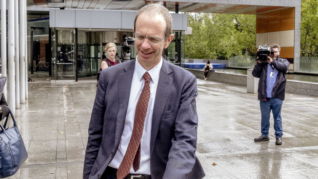ASIC deputy chair Peter Kell leaves the banking royal commission hearing. 