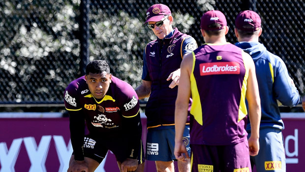 Tevita Pangai Jr takes instructions from former coach Wayne Bennett during their time together at the Brisbane Broncos in 2018.
