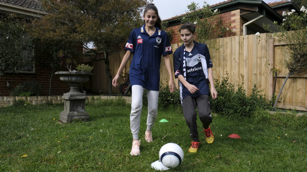 Nathalia Candiloro and brother Marco take part in Melbourne Victory's remote learning activities at home in Box Hill. 