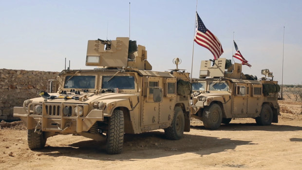 US forces take up positions on the outskirts of the Syrian town of Manbij in 2017.