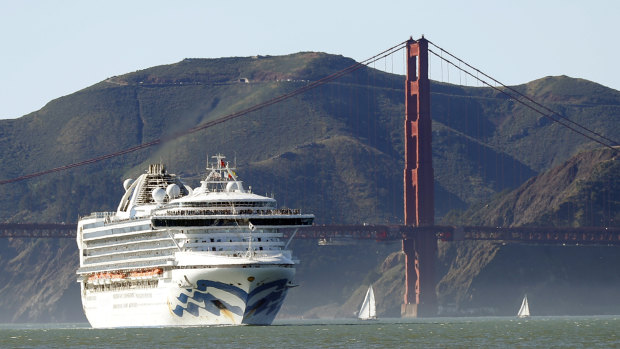 The Grand Princess cruise ship passes the Golden Gate Bridge earlier this month as it arrives from Hawaii in San Francisco. 