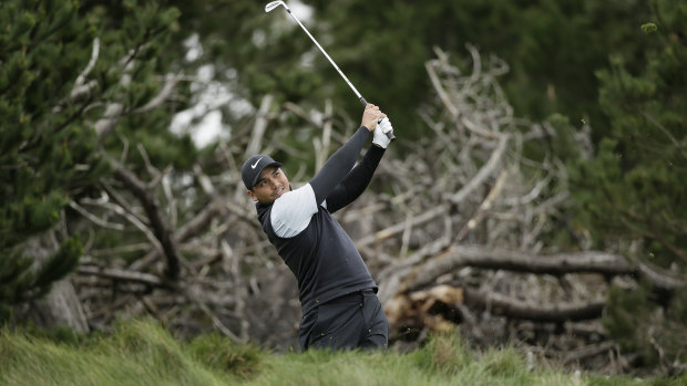 Jason Day follows his shot from the third tee of the Spyglass Hill Golf Course during the second round at Pebble Beach.