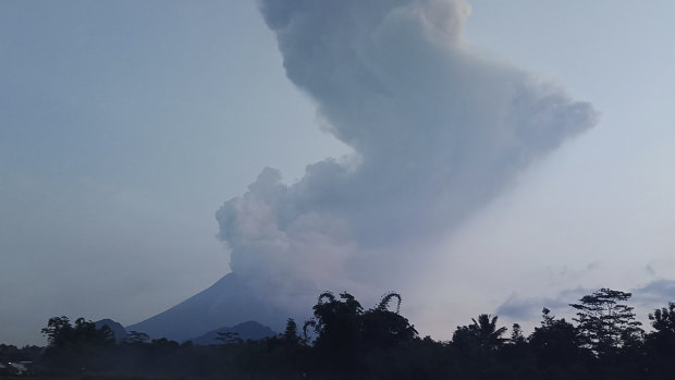 Mount Merapi spews volcanic material into the air in Sleman, Indonesia.