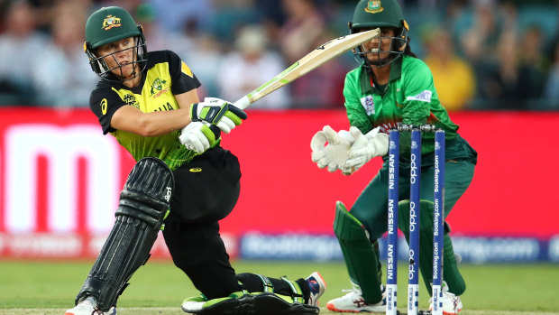  Alyssa Healy takes to the Bangladesh bowling attack in Canberra on Thursday night.