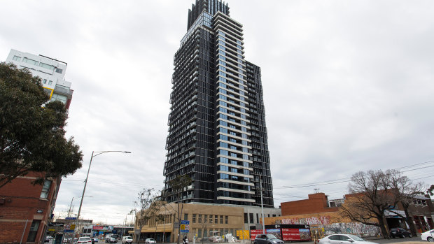 An office at the base of the residential tower at 420 Spencer Street has leased.