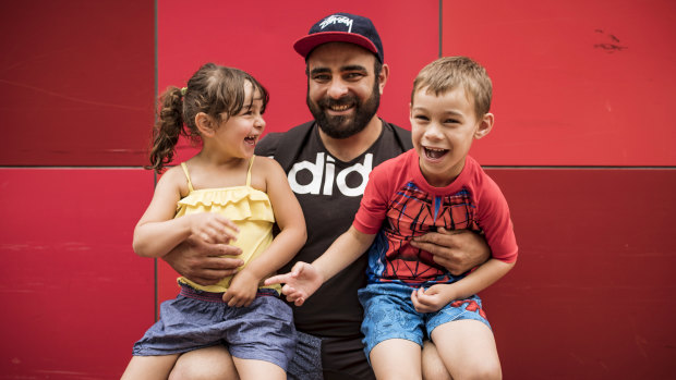 Robert Abboushi with children Zyana and Mason. "I can't speak for everyone. I just like kids," he says.