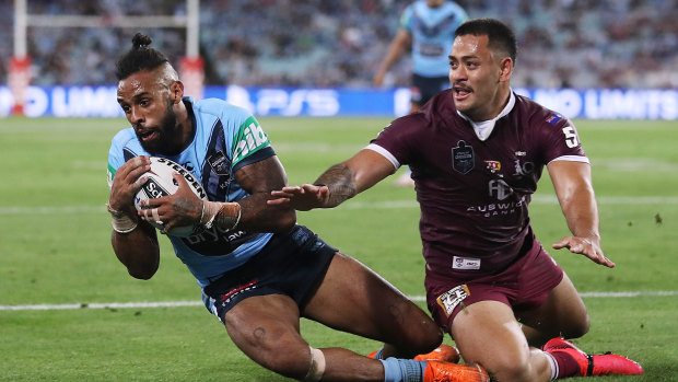 Josh Addo-Carr of the Blues scores a try during game two of the 2020 State of Origin series between the New South Wales Blues and the Queensland Maroons.
