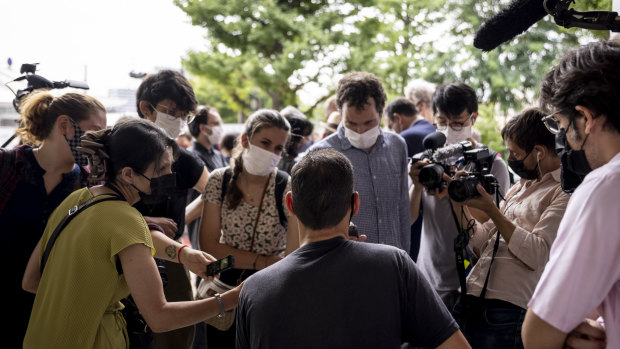 Vincent Fichot, centre with back to camera, attracted the attention of Western media during his hunger strike in Tokyo. 