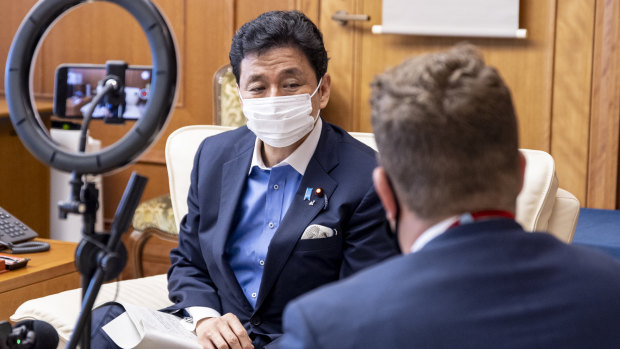 Japanese Defence Minister Nobuo Kishi being interviewed in his office in Tokyo. 