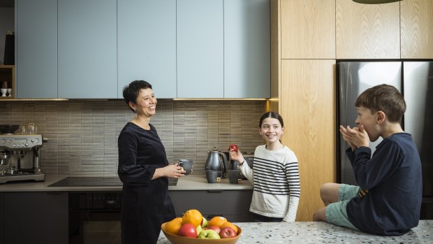 Sherrin Yeo and her children Isabelle and Elliot spend time in their electric-powered kitchen.