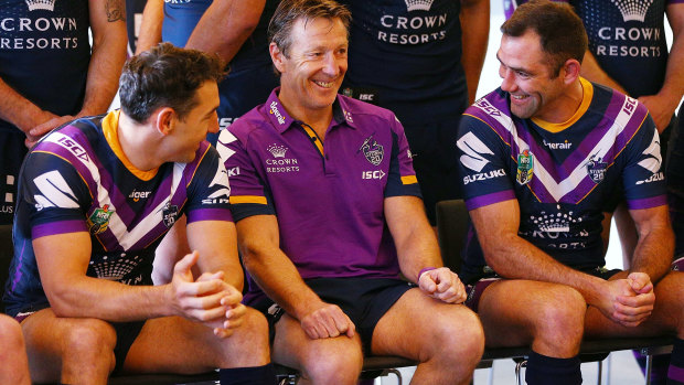 Storm coach Craig Bellamy with Cameron Smith and Billy Slater.