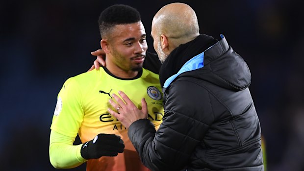 Pep Guardiola embraces Gabriel Jesus after City's victory against Leicester City at The King Power Stadium.