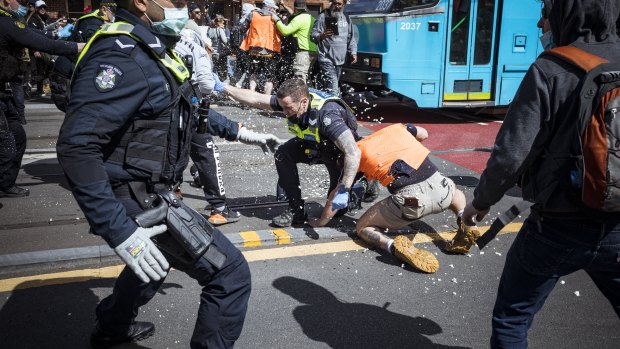 Protesters clashed with police during a violent anti-lockdown rally in Melbourne’s inner east on September 18.