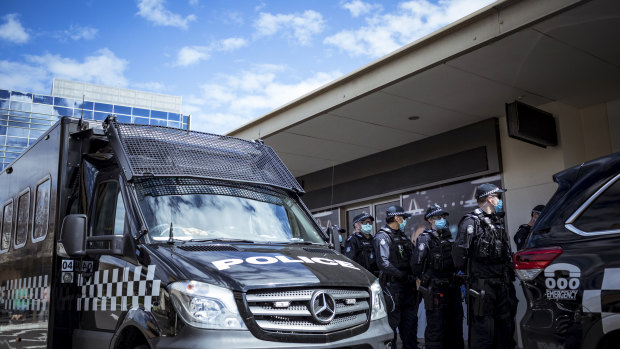 Police arrive at Chadstone Shopping Centre on Sunday.