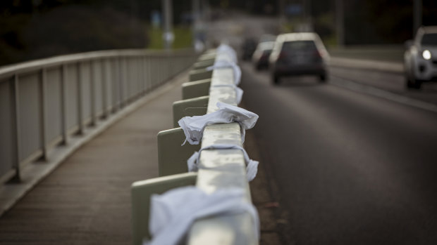 White bows in memory of Samantha Fraser adorn the bridge connecting Phillip Island to the mainland 