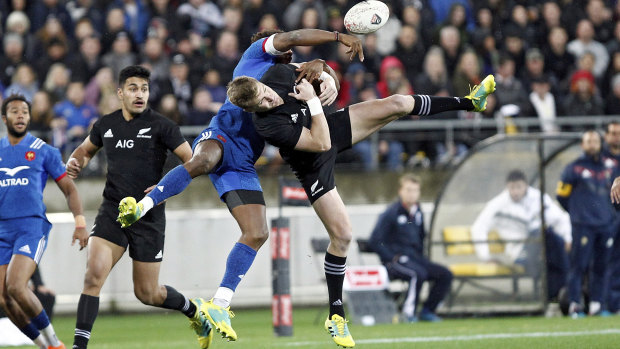 Red card: New Zealand's Jordie Barrett, right, and France's Benjamin Fall collide. 