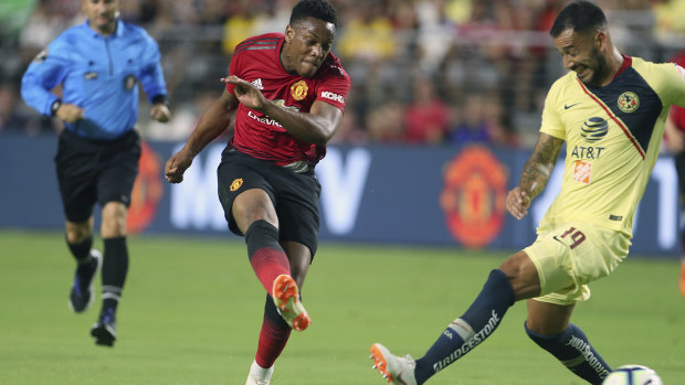 Early exit: Anthony Martial in action against Club America.
