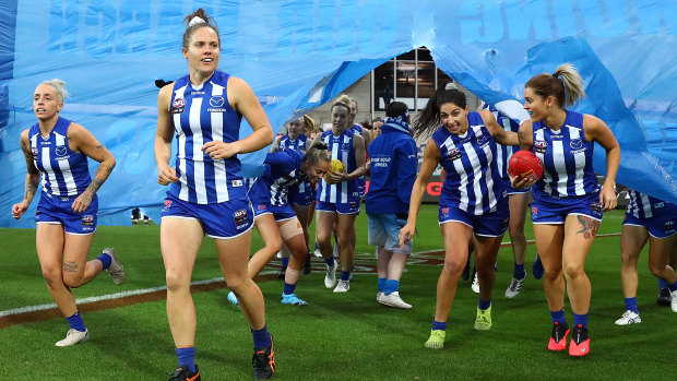 Hopping to it: Emma Kearney leads the Kangaroos out during the 2020 AFLW season.