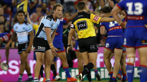Tough call, sir: Cronulla's Matt Moylan argues against a penalty in the Sharks' defeat against Newcastle on Friday.