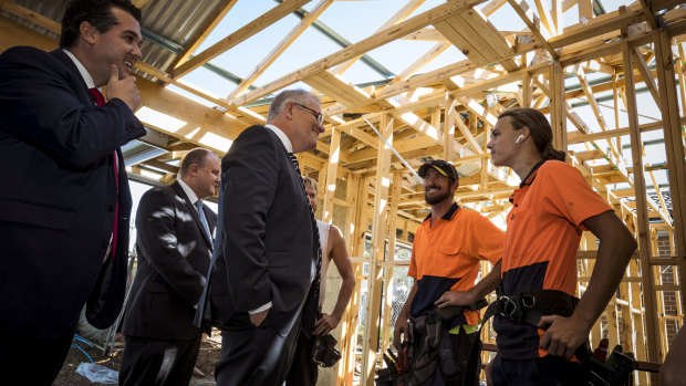 Prime Minister Scott Morrison and Housing Minister Michael Sukkar MP meet builders in the Melbourne suburb of Officer in February.