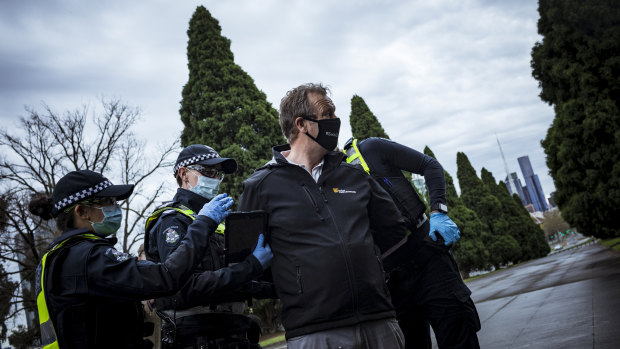 An anti-lockdown supporter is detained by Victoria Police after refusing to provide details and being in non-compliance with the Chief Health Officer's guidelines.