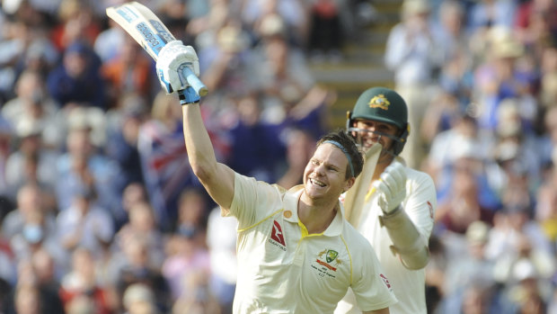 Steve Smith celebrates after scoring a century on his return to Test cricket.