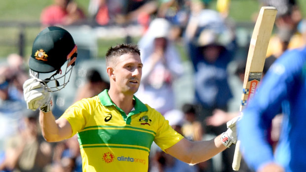 Shaun Marsh acknowledges the crowd after reaching his century at Adelaide Oval on Tuesday.