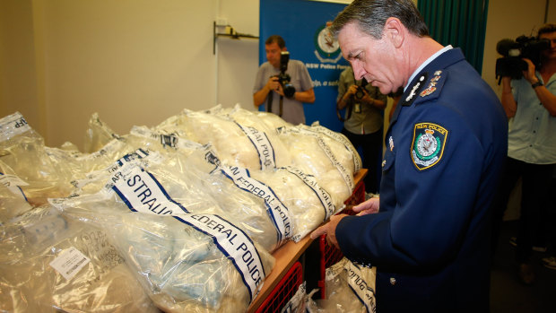 Then NSW Police Commissioner Andrew Scipione inspects the drug haul at the centre of the trial.