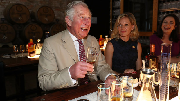 Prince Charles enjoys a tipple at the Bundaberg Rum Distillery.