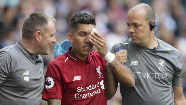Racing the clock: Roberto Firmino needs to prove his fitness after sustaining an eye injury on Saturday.