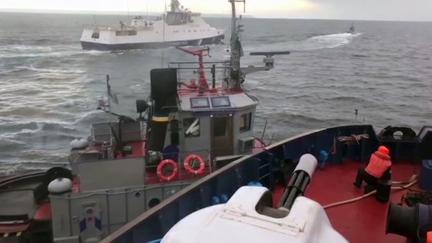 A video screenshot taken from a Russian Coast Guard vessel purports to show the Russian coast guard and a Ukrainian tugboat collide in the Kerch Strait on Sunday. 