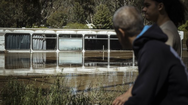 Floodwater inundates the caravan park at Murchison.