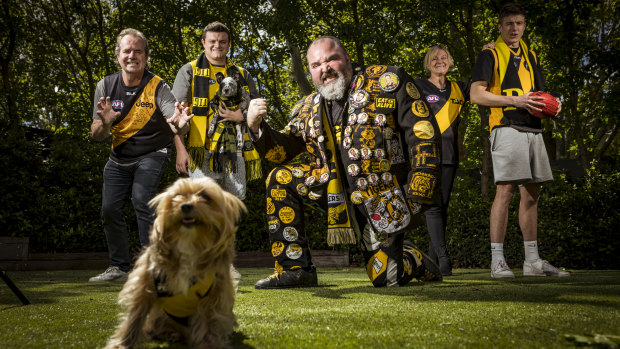 Fanatical Richmond supporter Richard Alford with mates/clients Luke, Jack, Monique and Hunter Silk (with dogs Marley and Dusty).
