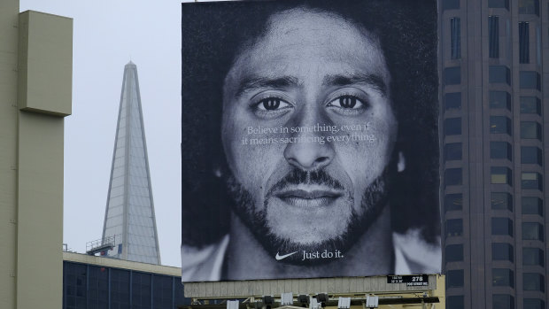 A Colin Kaepernick billboard on top of a Nike store in San Francisco.