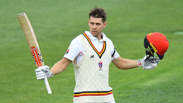 Henry Hunt celebrates a century for the Redbacks.