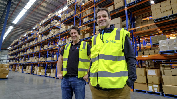 eBay's David Ramadge  and Australia Post's Ben Franzi at the Fulfilio fulfilment centre near Melbourne Airport.  