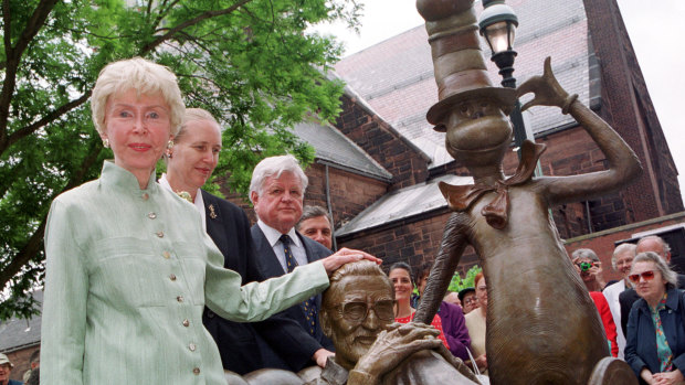 Audrey Geisel with sculpture of her husband with The Cat in the Hat.