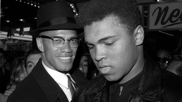 American Muslim activist Malcolm X pictured with boxer Muhammd Ali in 1964. 