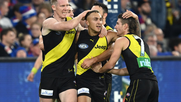 Shai Bolton is congratulated after a goal.