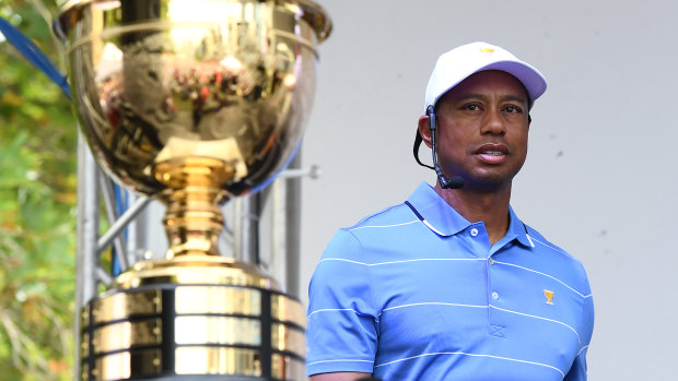 Tiger Woods with the Presidents Cup in Melbourne on Monday evening.