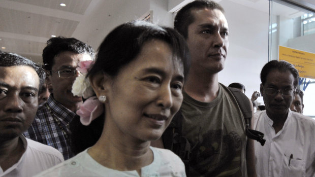 Suu Kyi reunites with her son Kim Aris, right, in 2010 after being released from house arrest. She had been detained for 15 of the preceding 21 years.