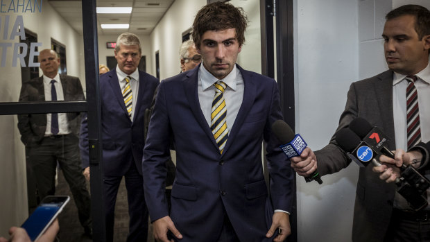 Andrew Gaff leaves the tribunal.